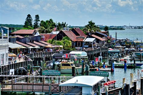 Johns pass - Tour Johns Pass Village & Boardwalk in Madeira Beach Florida. Johns Pass is more than just the boardwalk. Although Johns Pass has a small sandbar that you can swim in, there is a full beach right ...